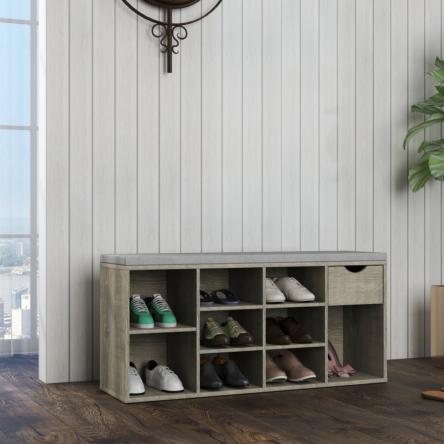 Wooden shoe rack with shoes against a light wooden paneled wall.