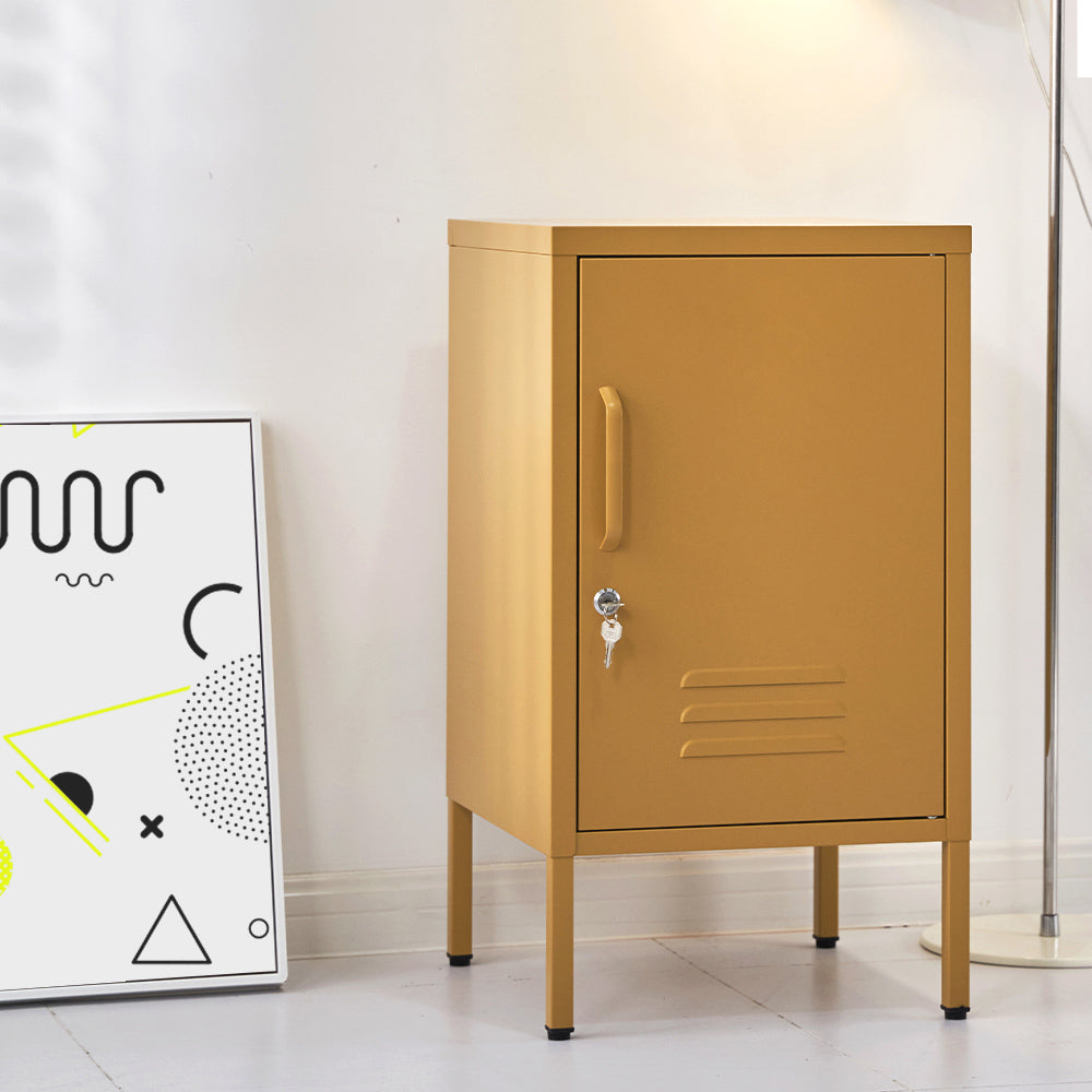 Yellow metal locker against a white wall with a framed poster on the left.