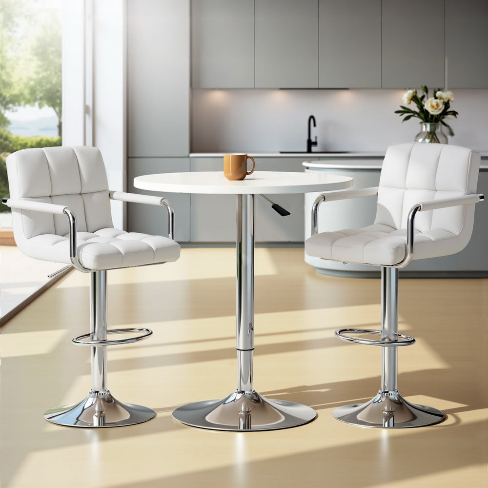Sleek NORDIQE Elyrius Bar Table Set in white faux leather with chrome accents — modern design perfect for contemporary spaces.