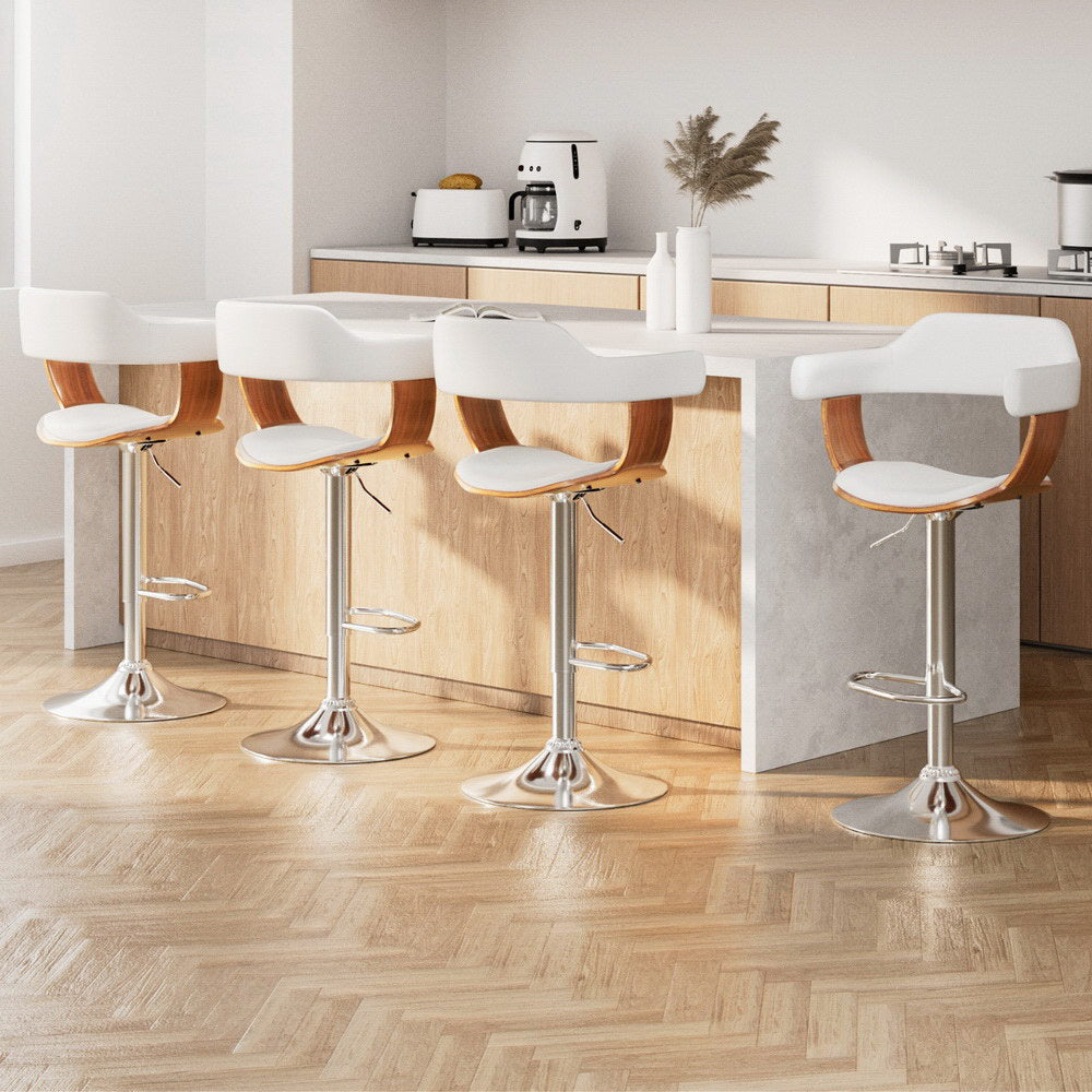 Sleek Selina Premium Bar Stool by NORDIQE in white with wooden accents — modern design featuring a polished chrome base.