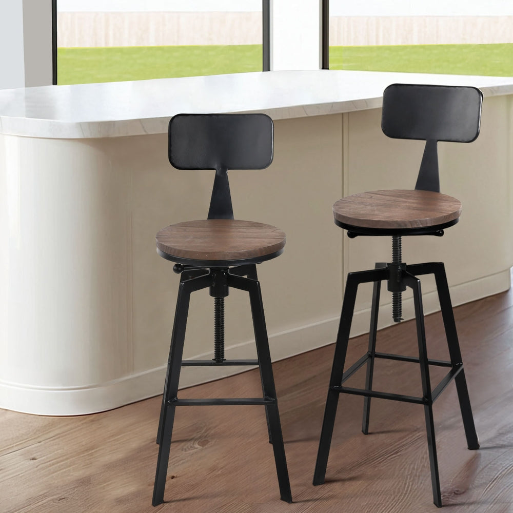 Ragno Industrial bar stools in black and brown featuring a rustic wooden seat and adjustable height mechanism for versatile seating.