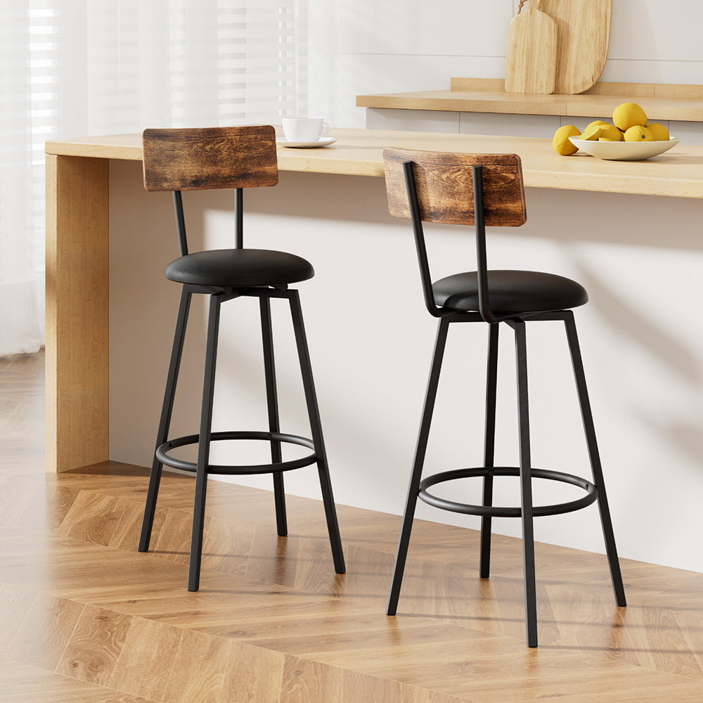 Stylish NORDIQE Kalnox Industrial bar stools in black and brown featuring a sleek metal frame and rustic wooden backrest