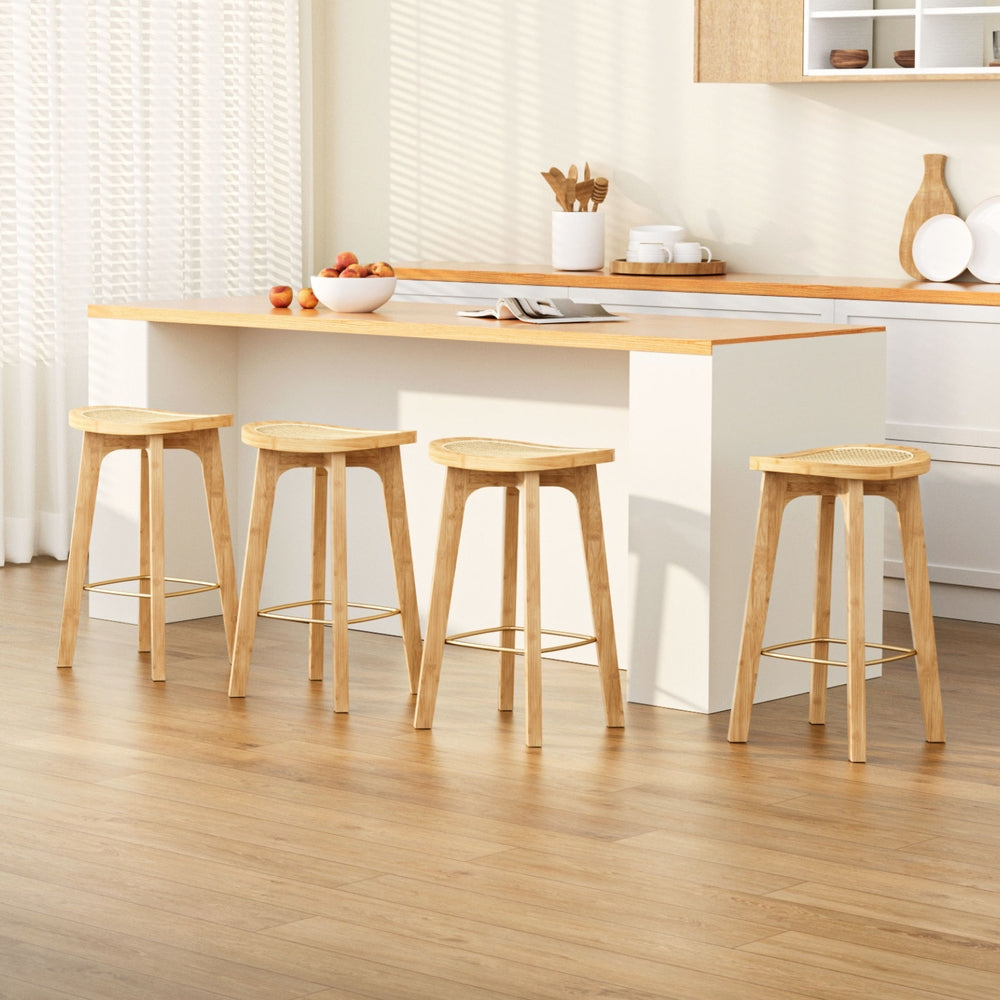 Cezar Rattan Bar Stools by NORDIQE in natural brown with a woven seat design, enhancing a modern kitchen aesthetic.
