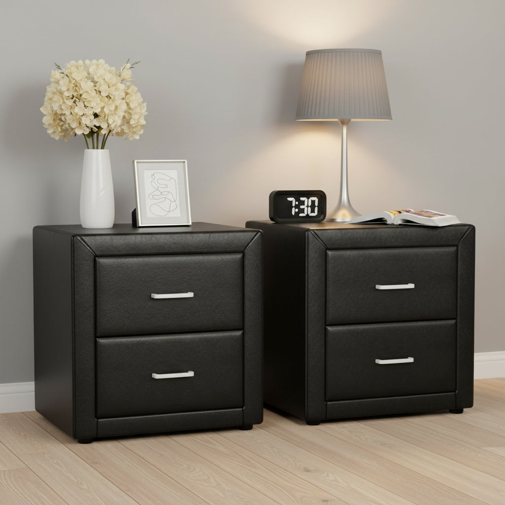 Two black nightstands with a lamp, clock, and decorative items in a room.