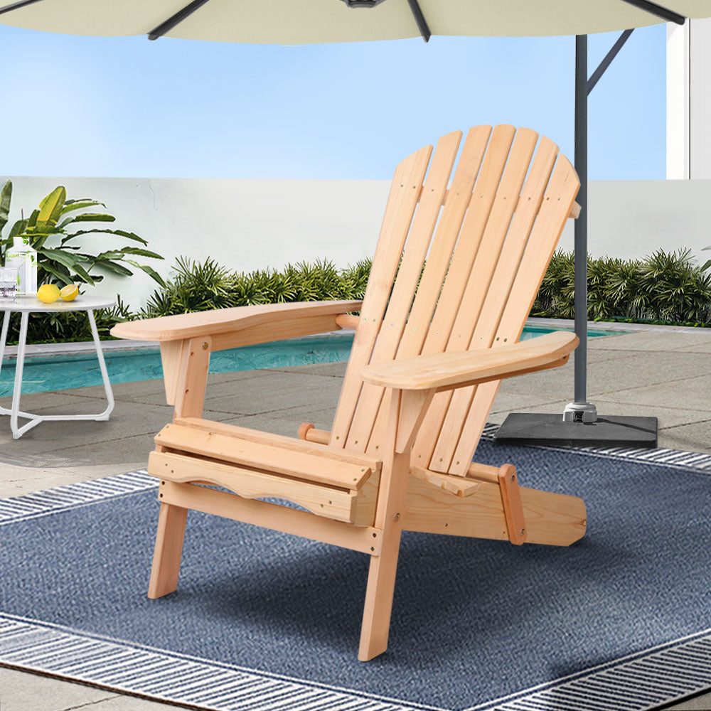 Becrick Adirondack Outdoor Chair | Beige in a stylish patio setting with a pool and umbrella.