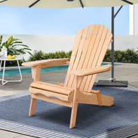 Becrick Adirondack Outdoor Chair | Beige in a stylish patio setting with a pool and umbrella.