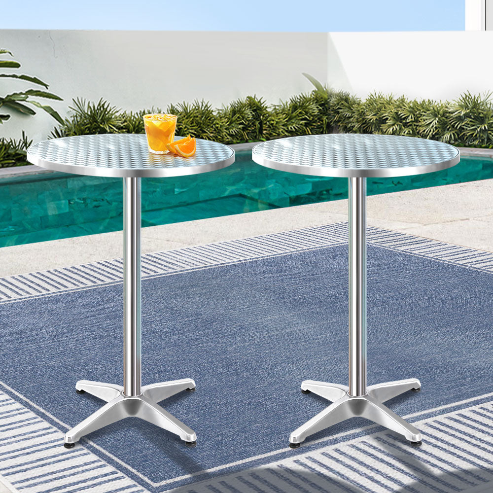 Ticate Outdoor Bar Table | Set of 2 | Silver displayed by a poolside, featuring two adjustable heights for convenience.