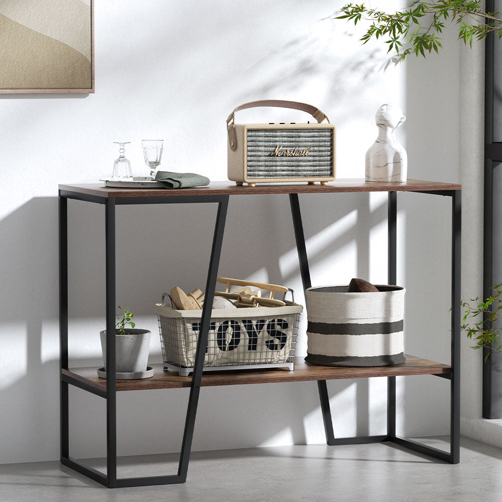 Console table with decorative items in a room setting