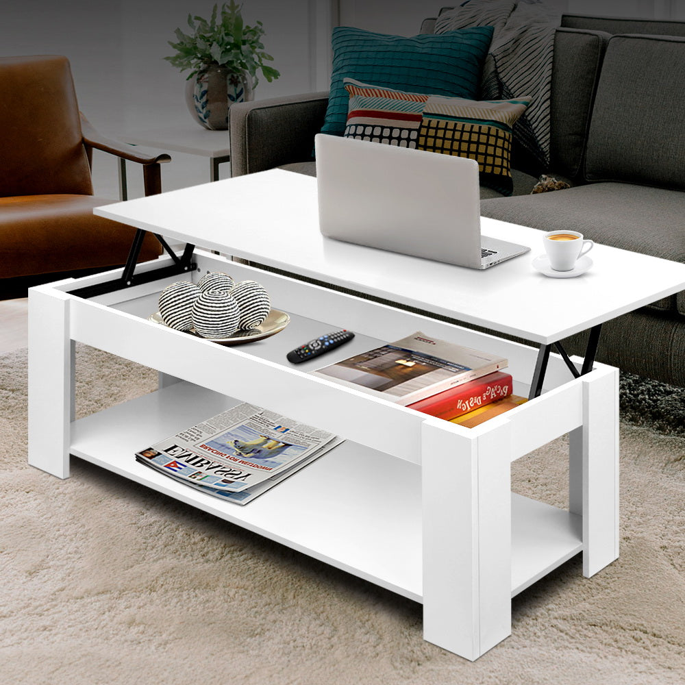 White coffee table with lift-top design in a living room setting.