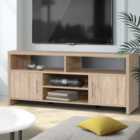 Wooden TV stand with electronic devices in a living room setting
