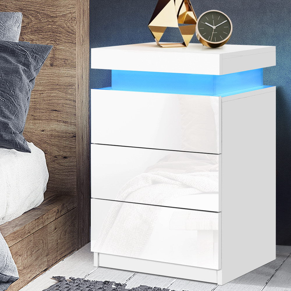 White dresser with blue LED strip light in a bedroom setting