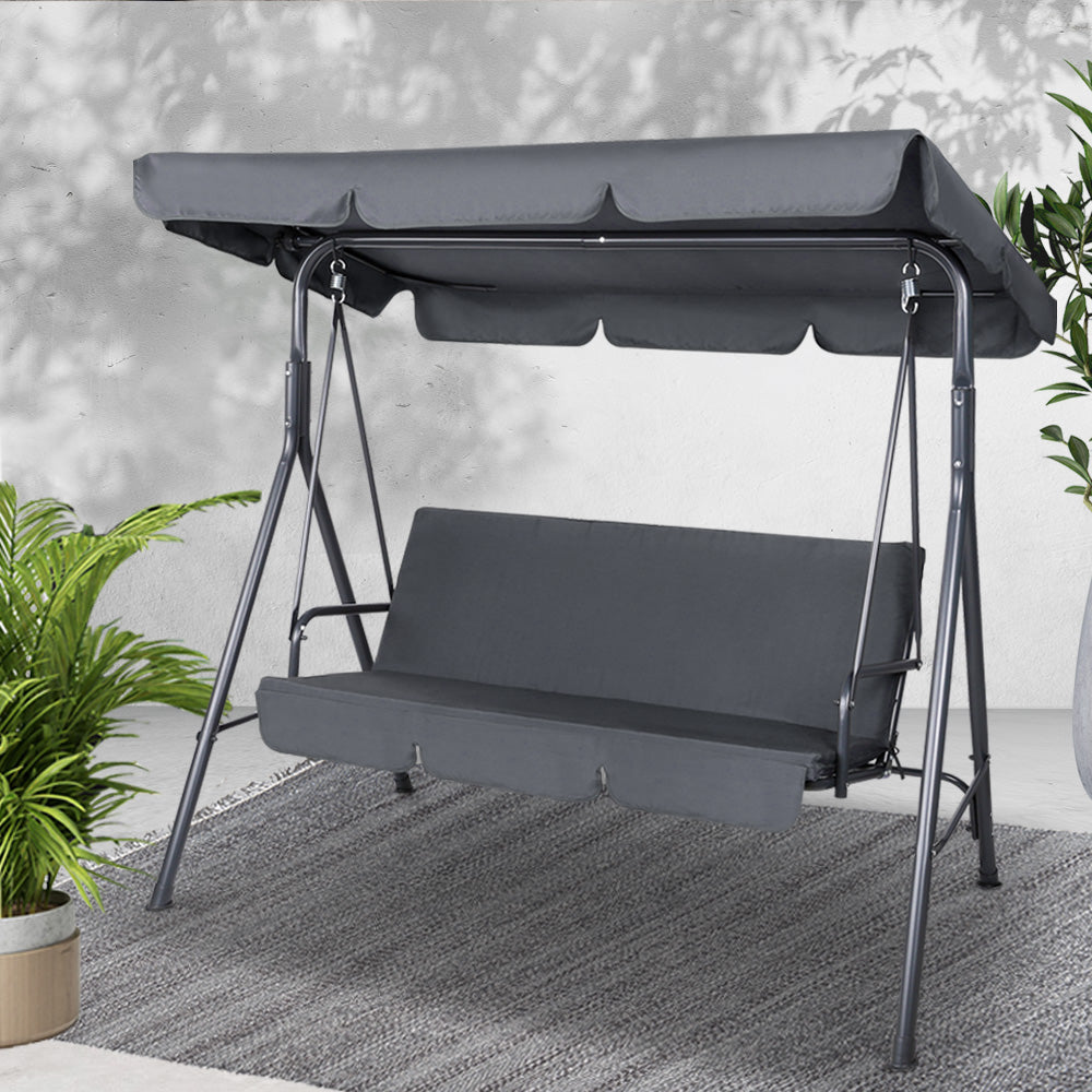 Grey outdoor swing chair with canopy by NORDIQE for three people