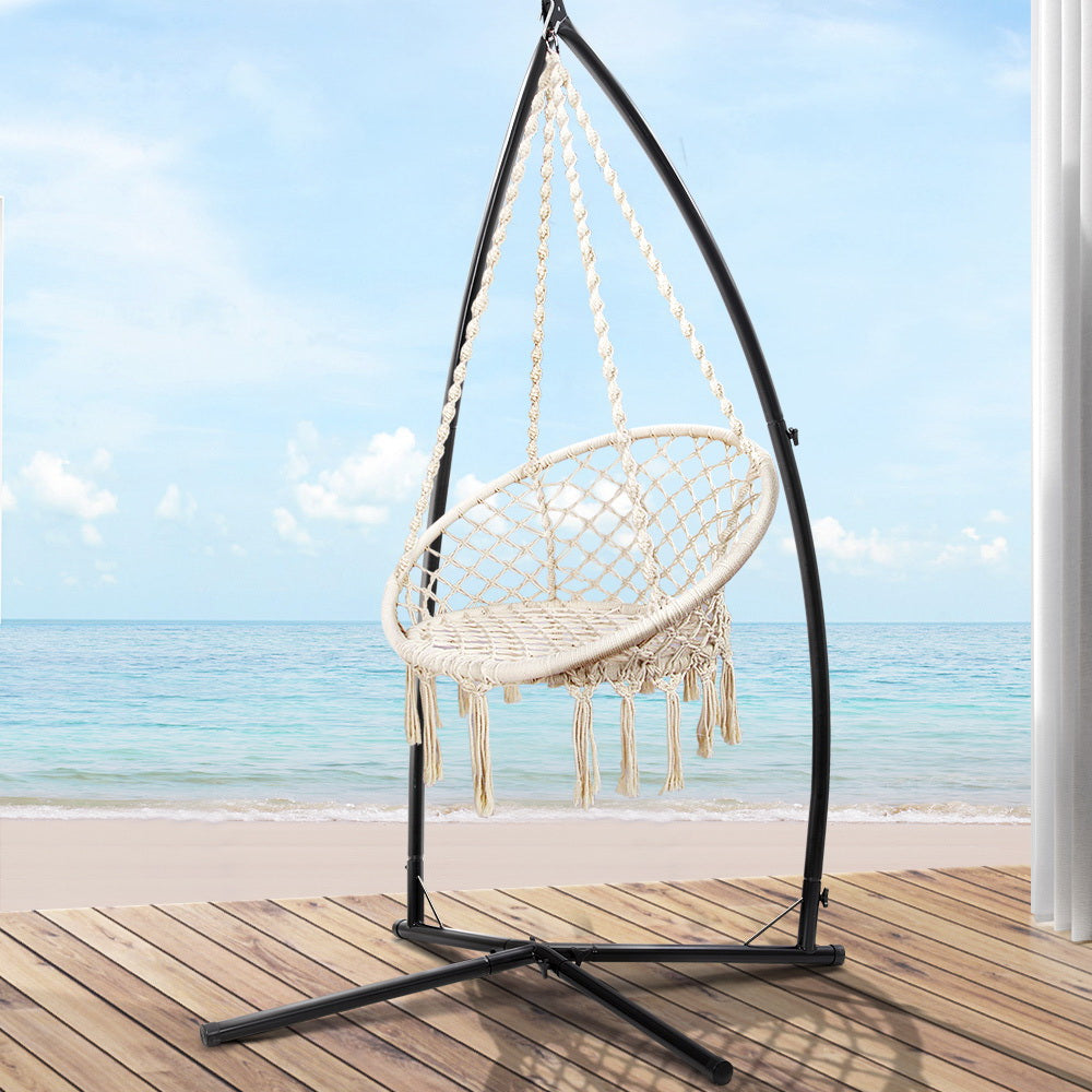 Macrame hammock chair in cream with steel stand by NORDIQE for outdoor use