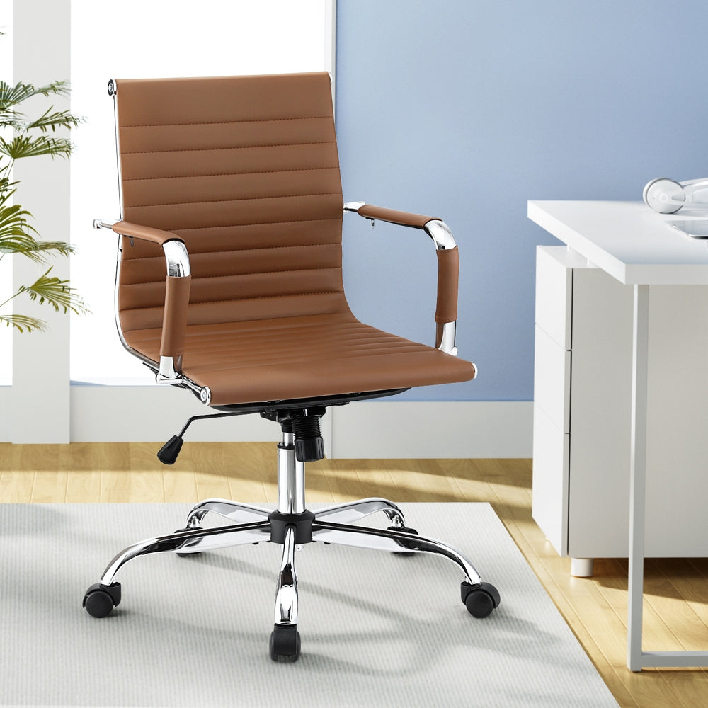 Sleek NORDIQE Nordak Office Chair in brown faux leather with chrome accents — modern design perfect for any workspace