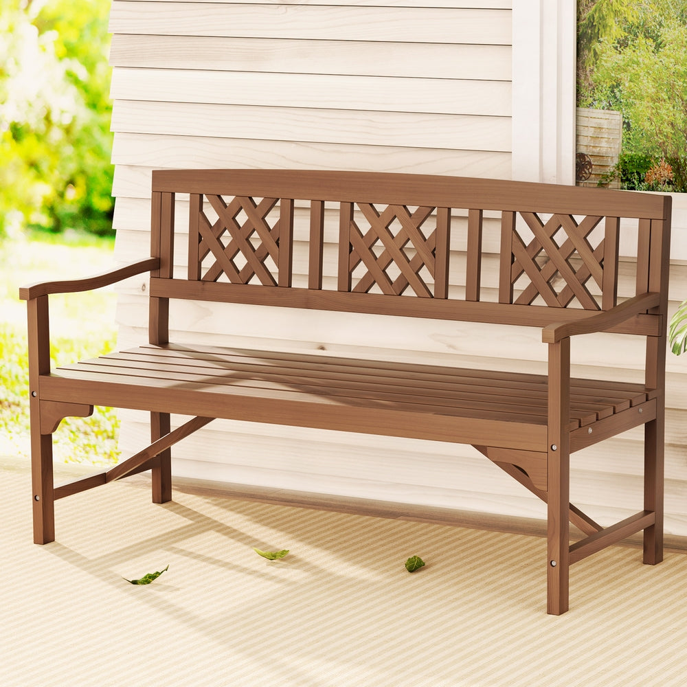 Esmock Outdoor Garden Bench | Brown with lattice-pattern backrest set in a charming outdoor space.