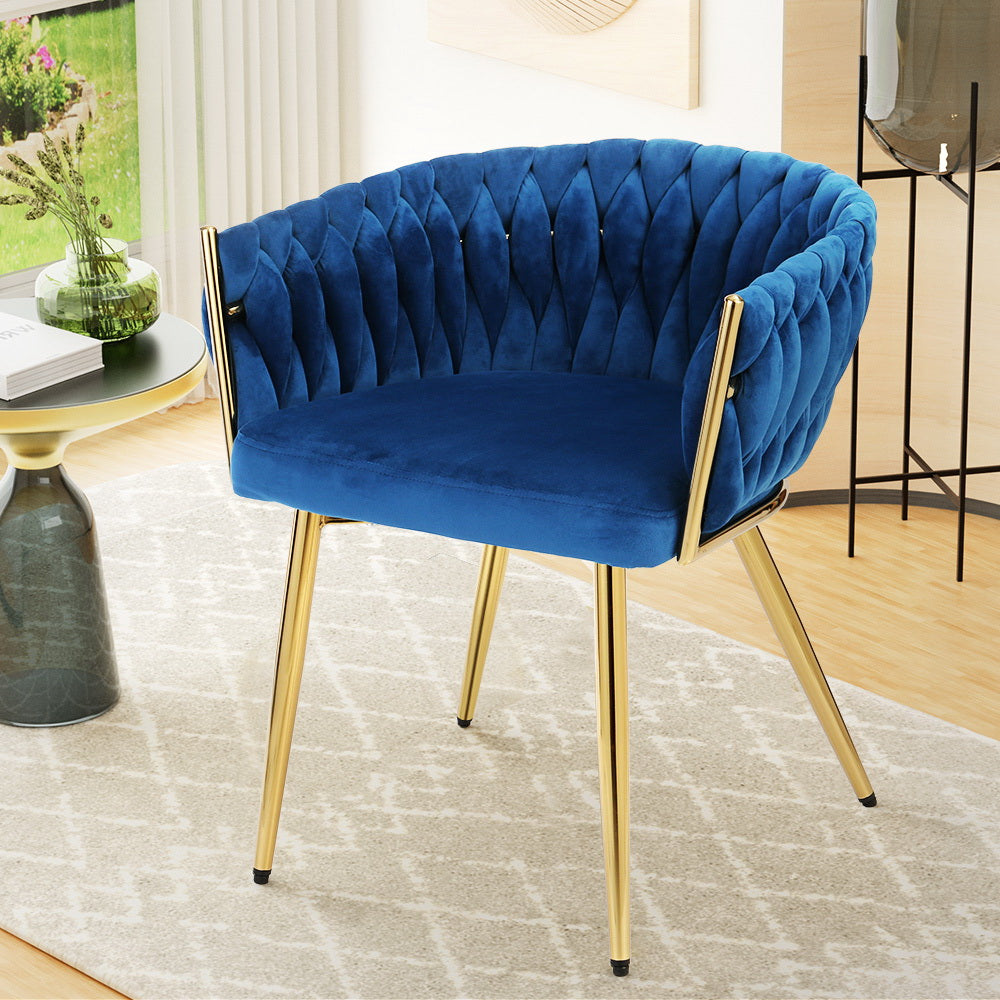 Elegant Boliri Dining Chair by NORDIQE in plush velvet blue with a stylish tufted design and sleek gold legs.