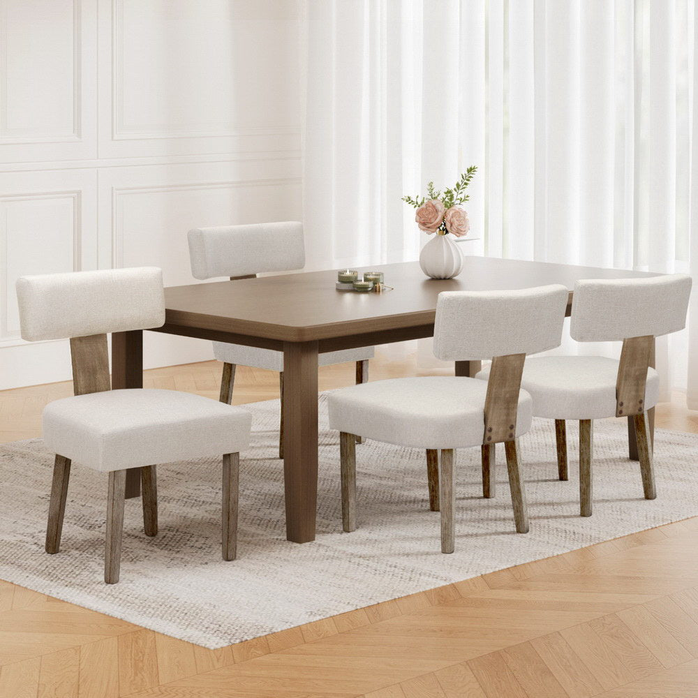 Milford Dining Chairs | Set of 4 | Beige arranged around a dining table, showcasing elegance and comfort in a modern dining space.