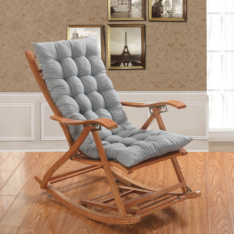 Long folding rocking chair with grey cotton cushion and plush pillow by NORDIQE