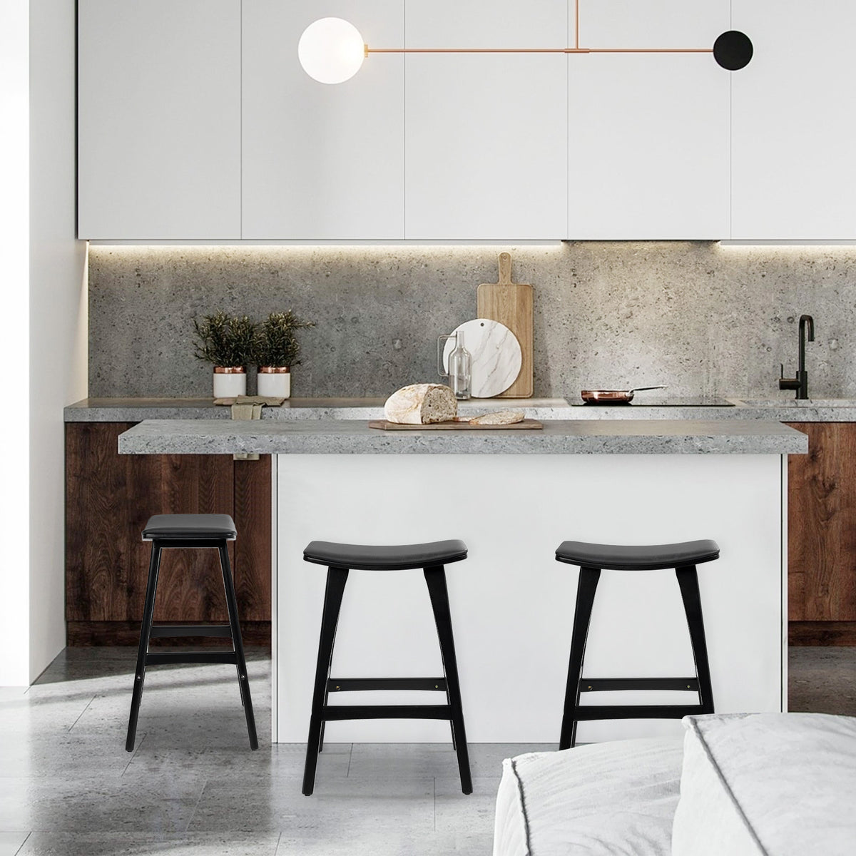 Kanso Elegant Bar Stool by NORDIQE in sleek black with a minimalist design, enhancing modern kitchen aesthetics.